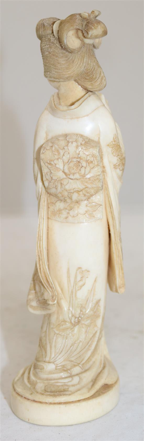 A Japanese ivory figure of a bijin, early 20th century, 19.7cm